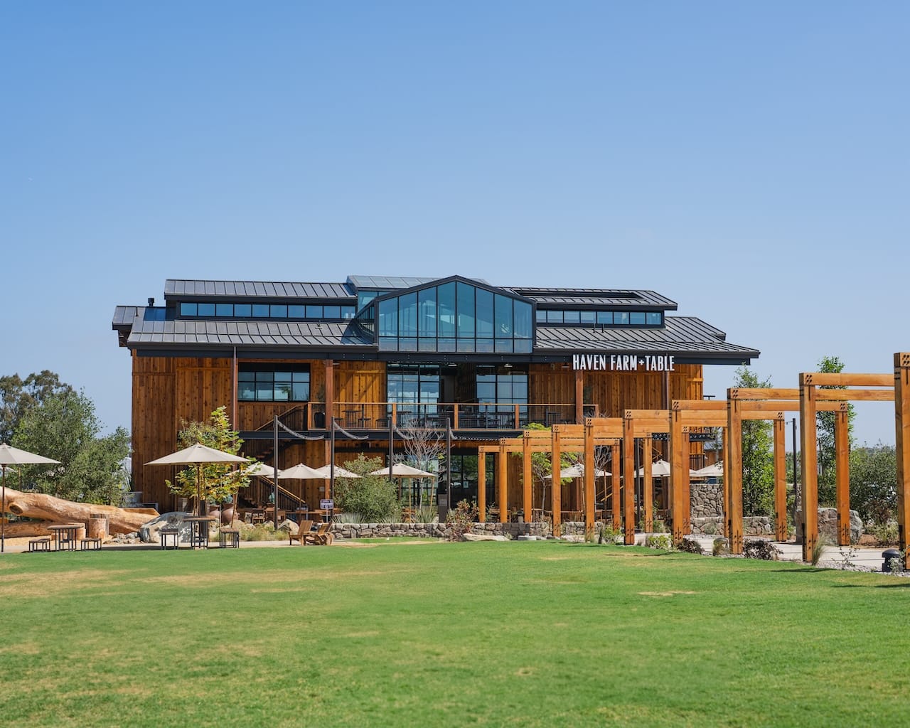 Hero image of new Fox Point Farms coastal agrihood community's restaurant and community center.